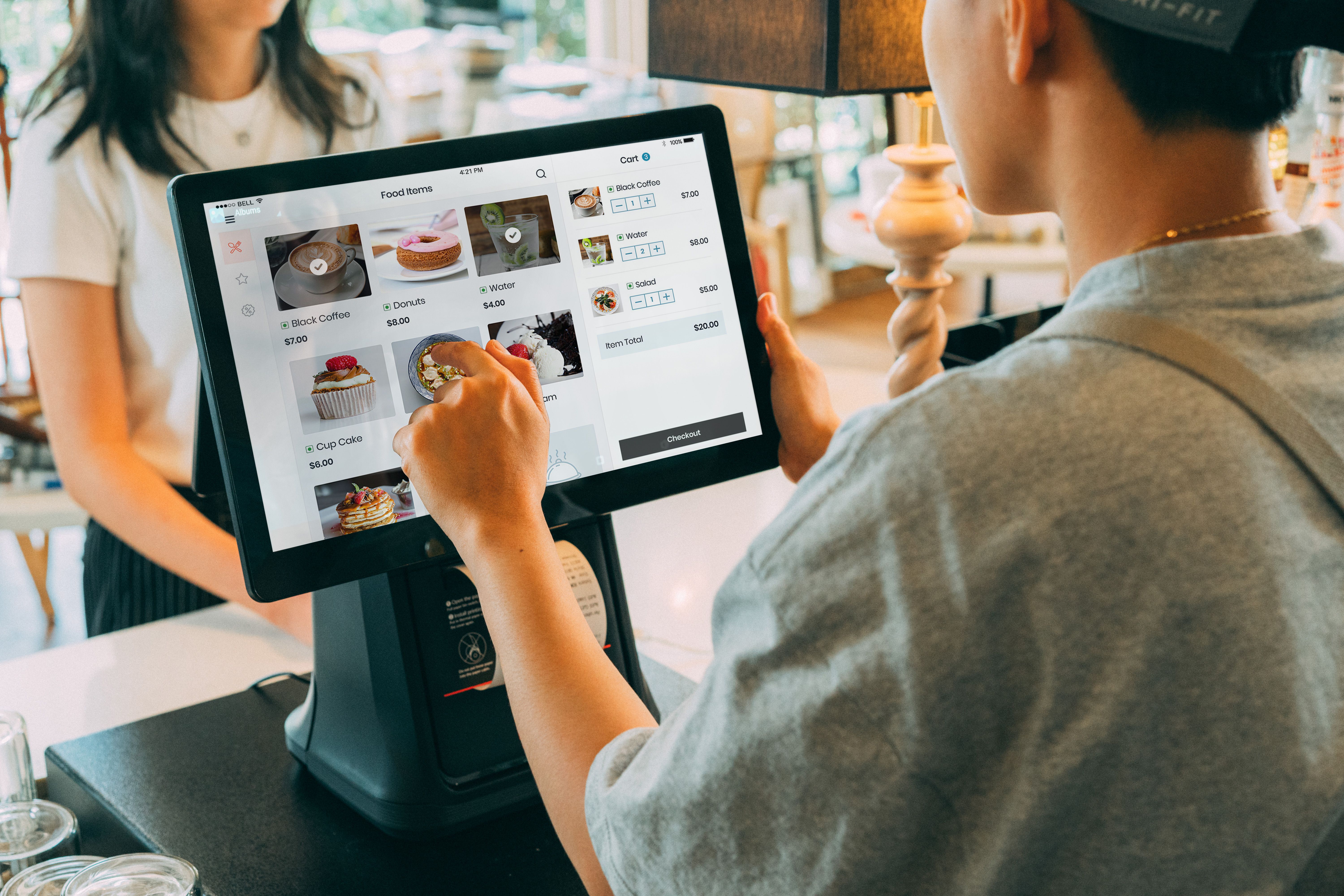 Cloud POS system tablet interface in restaurant